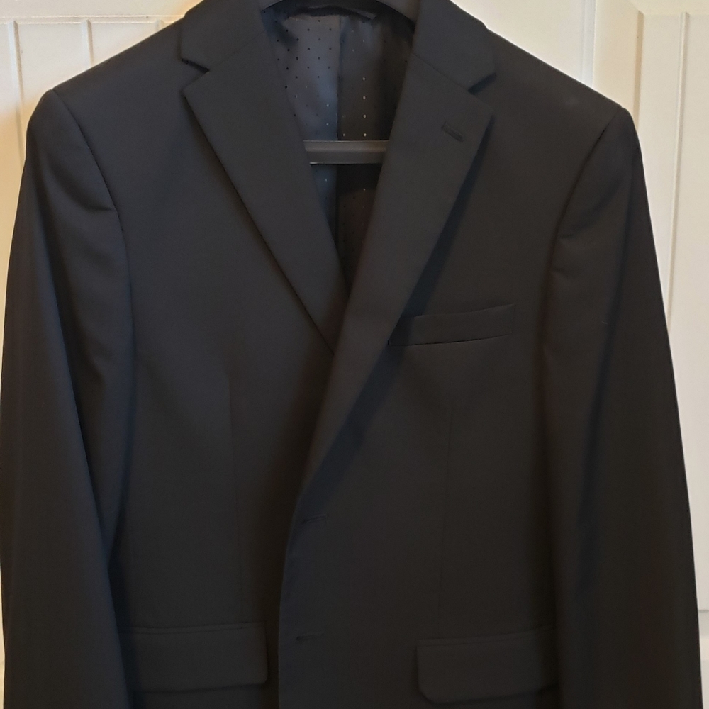 Black suit. Regular fit 16. Collection by Michael Strahan